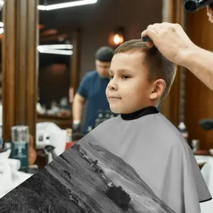 A Moody Betty Hill Kids Barber Apron