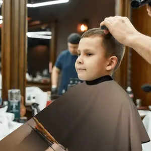 Lagoon With Two Boats In Green Kids Barber Apron