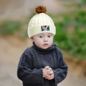 A Girl With A Goose Baby Knitted Cap