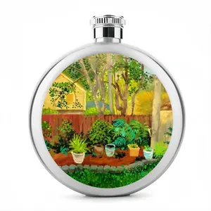 Backyard Garden With Yellow House Flagon