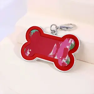 Pastoral Disturbance Dog Bone Keychain