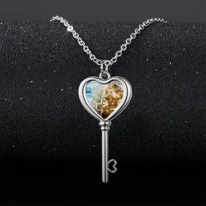 She Is Elsewhere Heart Shaped Key Necklace