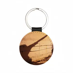 A Road Well Traveled Leather Circular Keychain