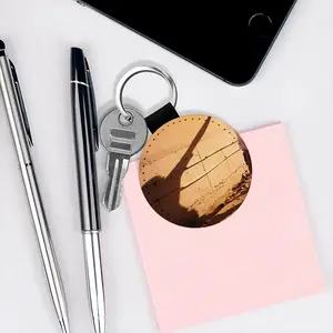 A Road Well Traveled Leather Circular Keychain