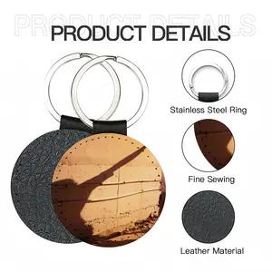 A Road Well Traveled Leather Circular Keychain