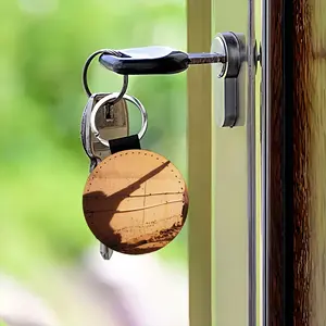 A Road Well Traveled Leather Circular Keychain