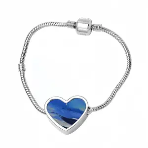 Into The Great Blue Heart Shaped Nnake Bone Bracelet