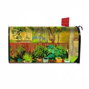 Backyard Garden With Yellow House Mail Box Cover