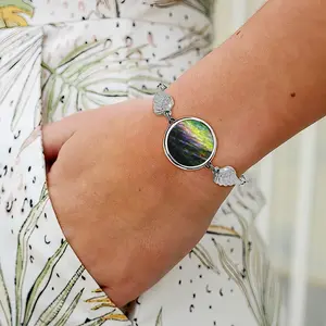 Watching Tv In Paris Winged Circular Bracelet