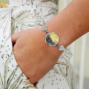 Singing Of The Sun Winged Circular Bracelet