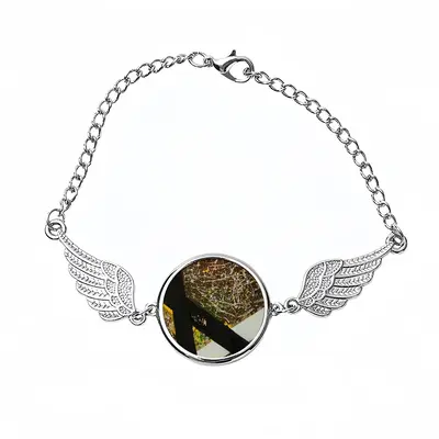 The Accident Winged Circular Bracelet