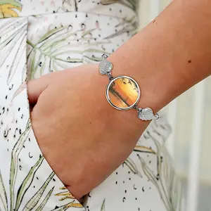 Setting Sun Of Tranquility Winged Circular Bracelet