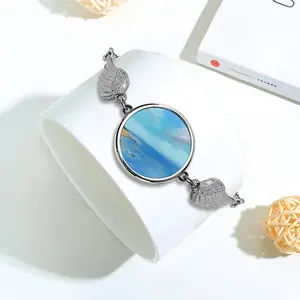 Cliffside Beach Winged Circular Bracelet