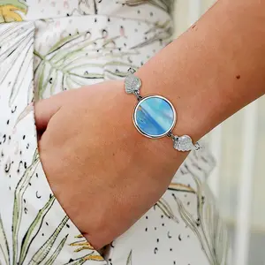 Cliffside Beach Winged Circular Bracelet