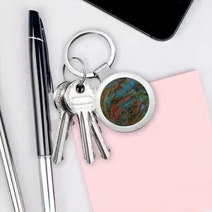 The Surveyed Planet Circular Keychain