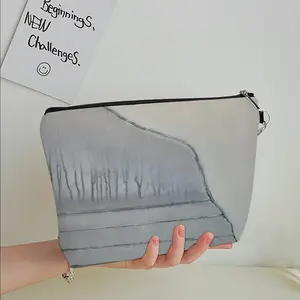 Rebirth - Minimalist Handheld Makeup Bag