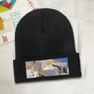 Santorini House And Cliffs In Oia Knitted Hat